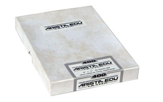 Arista 400 ISO 4x5 black and white film packaging for large format photography.