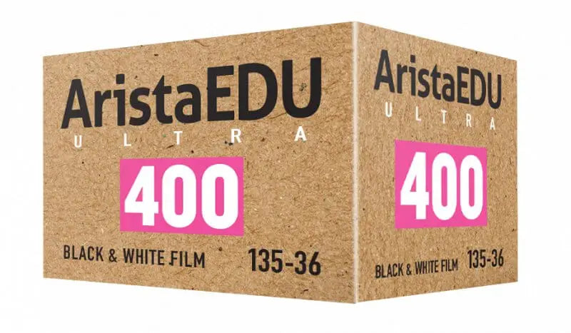 Aristaedu ultra 400 black and white film in a brown cardboard box with pink accents.