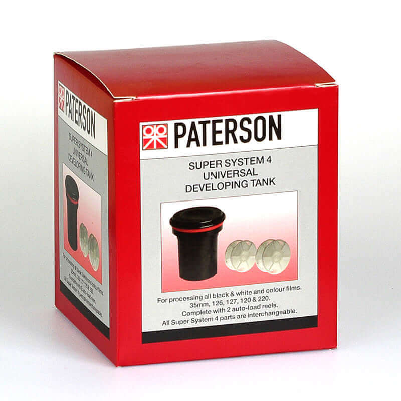 Paterson Super System 4 Universal Developing Tank packaging for black and white and color film processing with interchangeable parts.