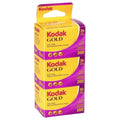 Kodak gold 200 film pack, vibrant purple and yellow packaging with three rolls of color negative film.