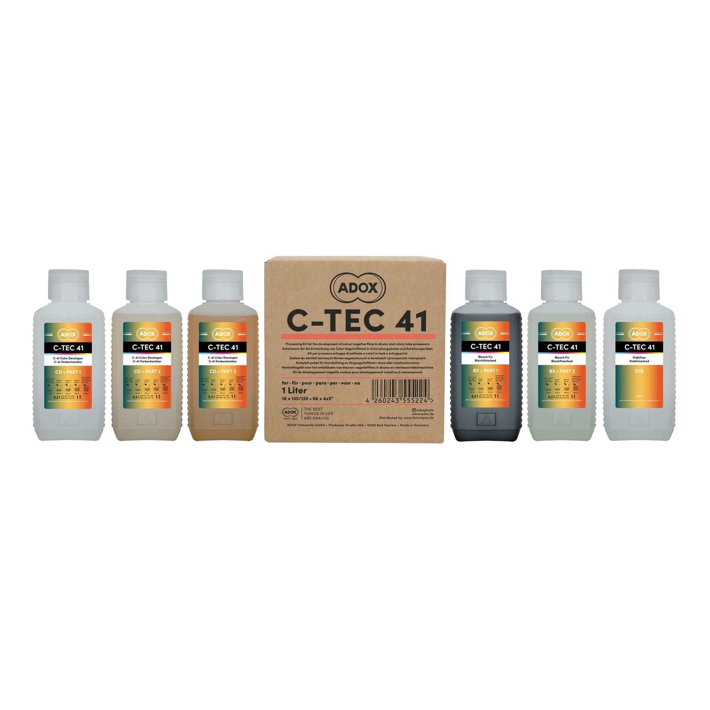 Adox C-Tec 41 film development kit with six chemical bottles and a central cardboard box for high-quality photo processing.