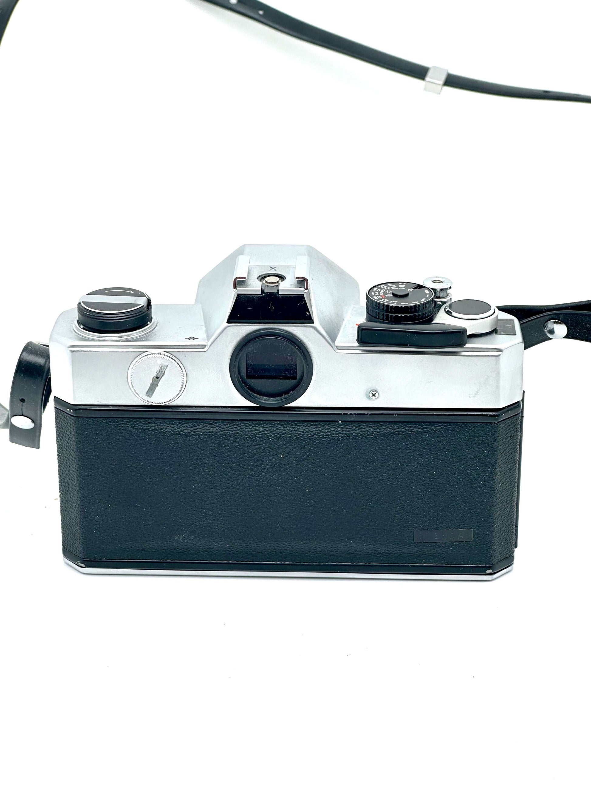 Rear view of Fujica ST801 vintage 35mm film camera with 55mm f1.8 Fujinon lens, highlighting the manual controls and viewfinder.