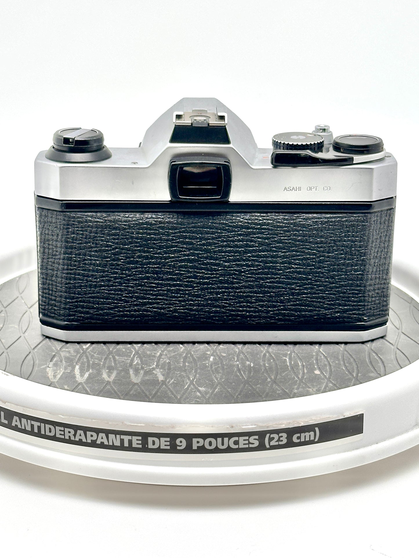 Vintage Japanese Asahi Pentax K1000 35mm film camera back view showing classic design and textured finish.