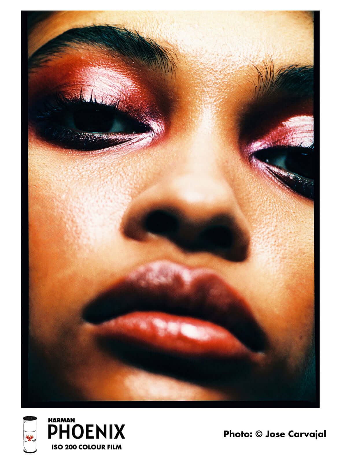 Close-up portrait with pink eyeshadow and glossy lips shot on HARMAN Phoenix 200 ISO 200 color film, by Jose Carvajal