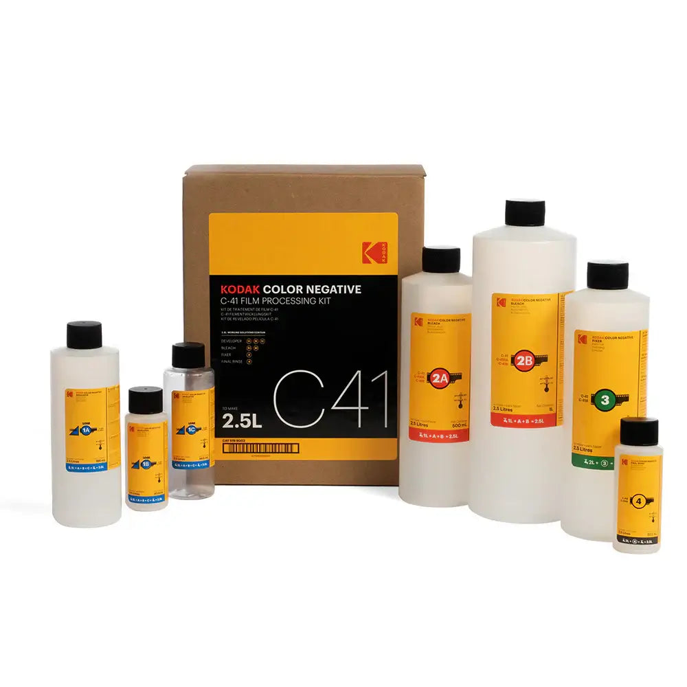 Kodak C-41 film processing kit with bottles of chemicals for developing color negative film.