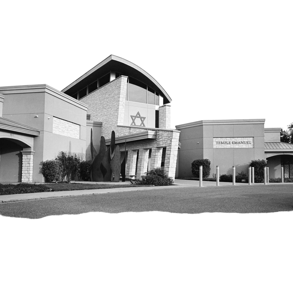 The black-and-white image shows a modern building with stone and concrete architecture, featuring an arched roofline, large windows, and a prominent star of david emblem on the facade.