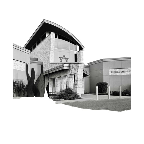 Stone-faced synagogue with a prominent star of david emblem above its entrance.