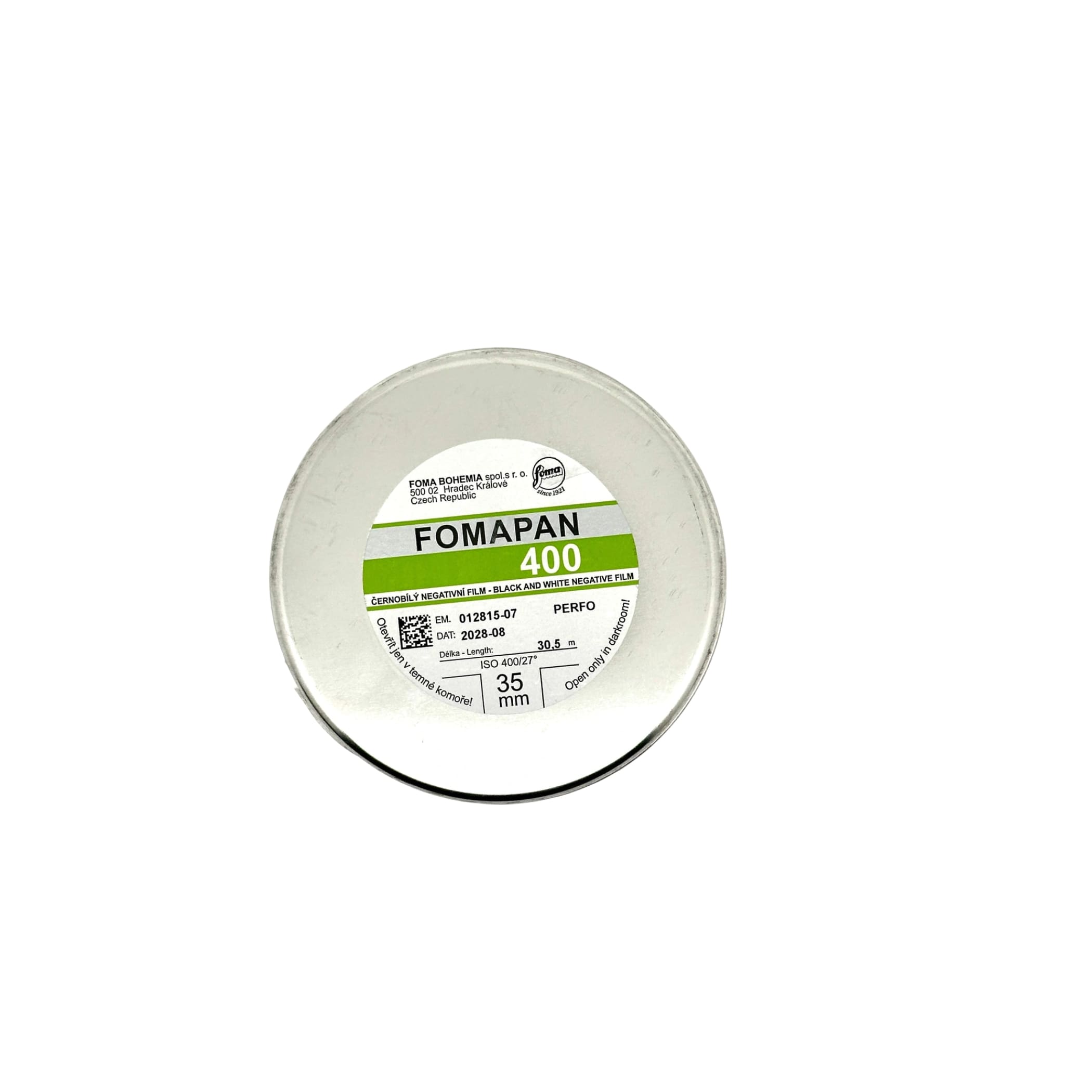 A circular container of fomapan 400 black and white negative film, featuring a clear plastic lid with printed specifications on its label.