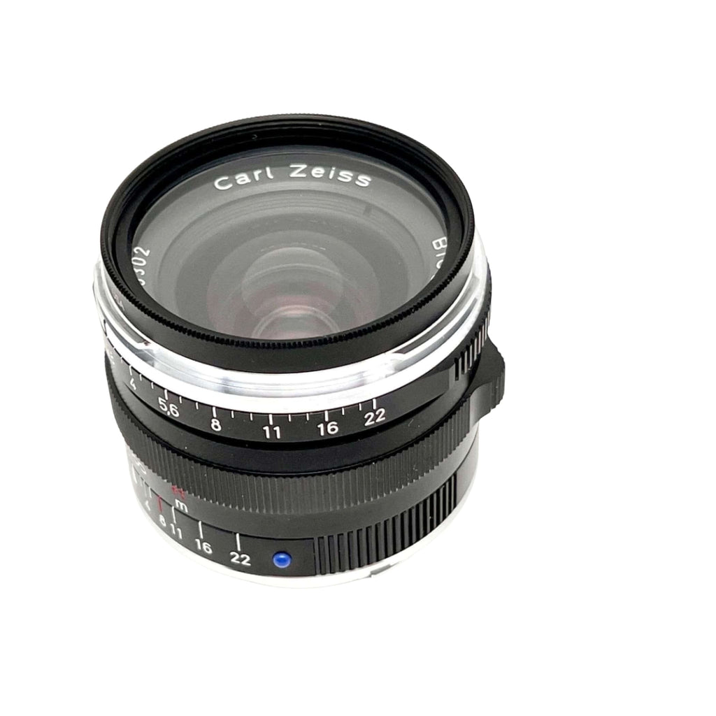 Black and silver carl zeiss lens with a classic, vintage design.