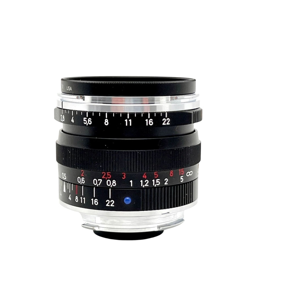 Black and silver leica summicron-m 35mm f/2 asph lens with engraved markings.