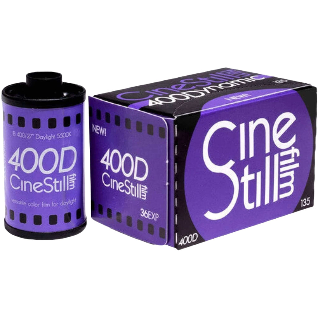 Purple cinestill 400d color film roll and box, featuring bold white lettering on a vibrant purple background with black accents.