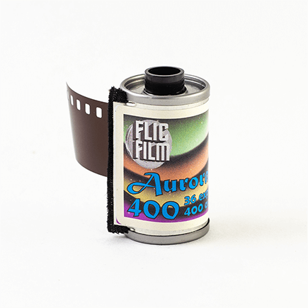 Flic Film Aurora 400 Color Negative 35x36 film canister, showcasing vibrant colors and natural skin tones.