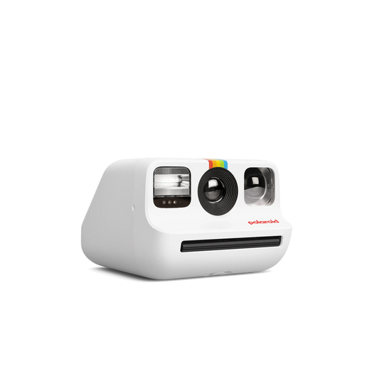 Retro style white instant camera with rainbow stripe and lens, perfect for capturing quick snapshots and nostalgic memories.