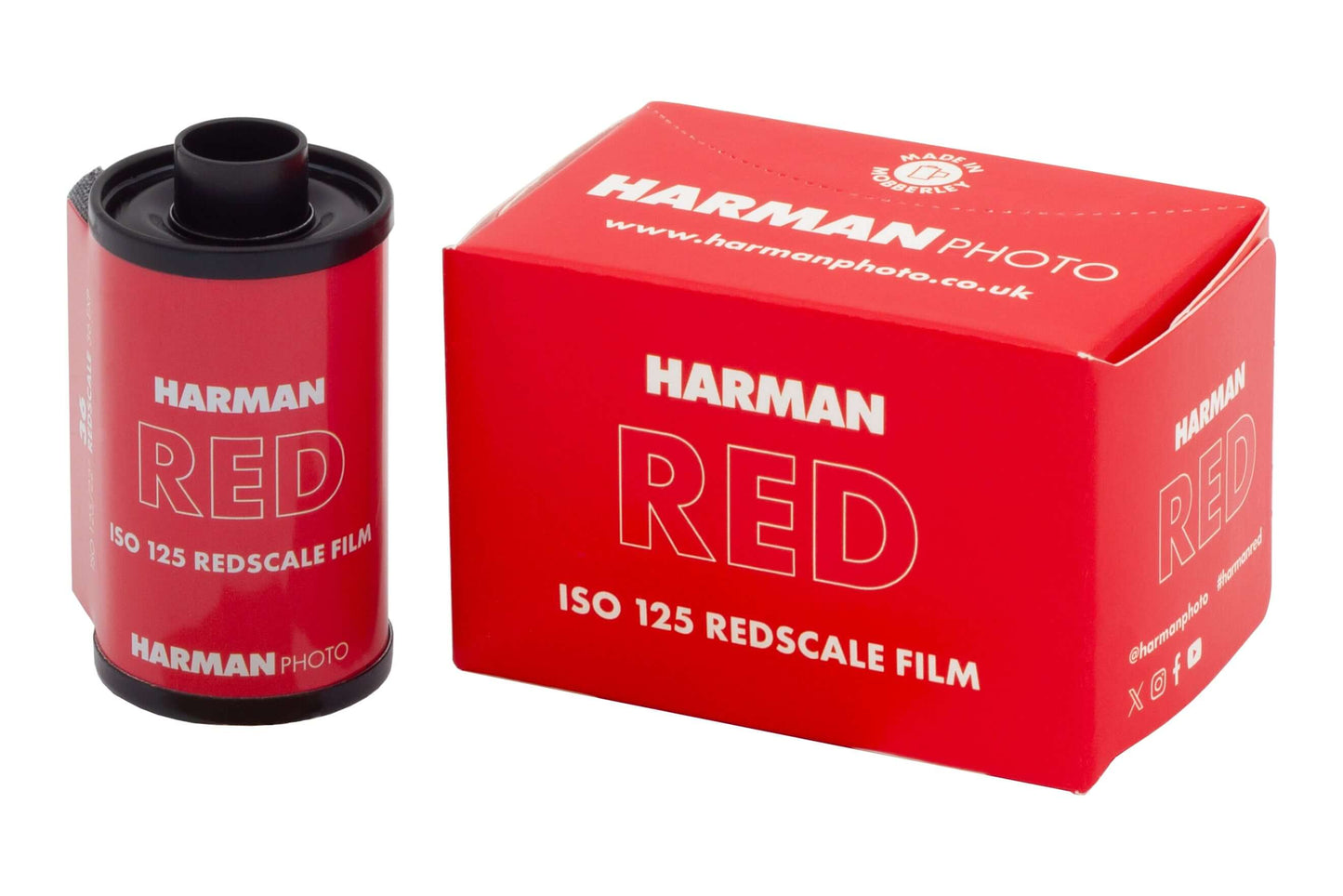 Harman Red 125 ISO Redscale 35mm film canister and packaging showcasing vibrant red design.
