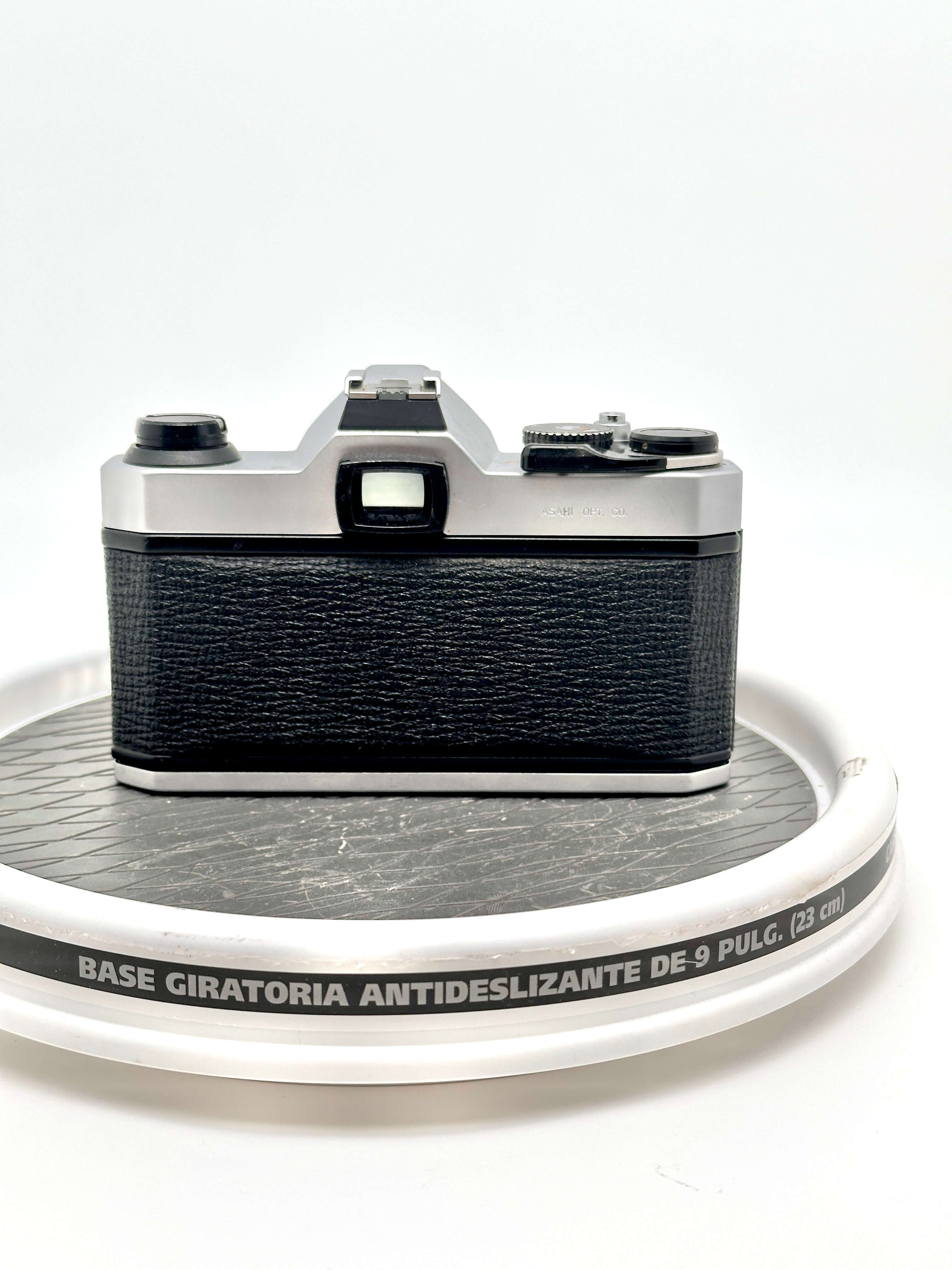 Back view of a used Japanese Asahi Pentax K1000 35mm film camera, showing its classic design and features.
