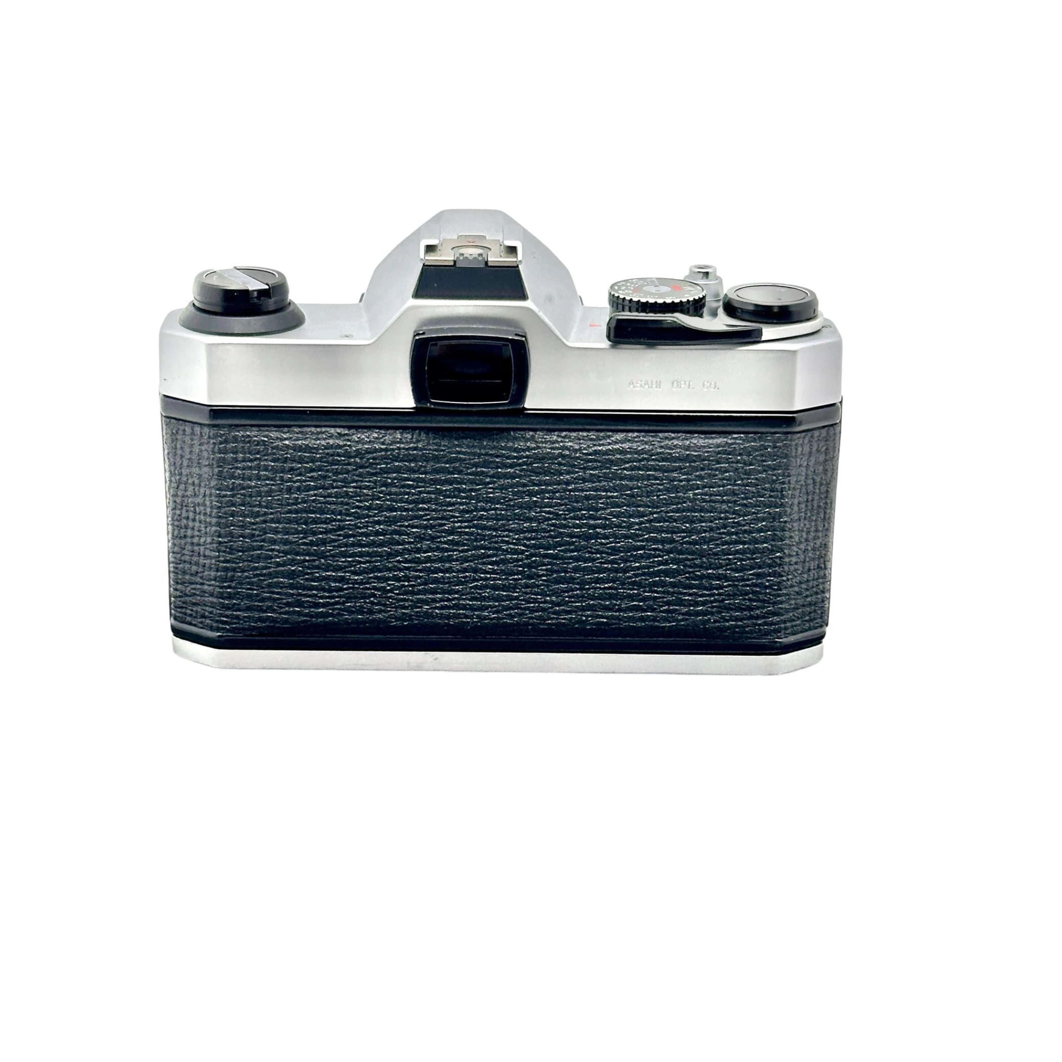 Silver-bodied canon ae-1 film camera with a textured black leather grip.