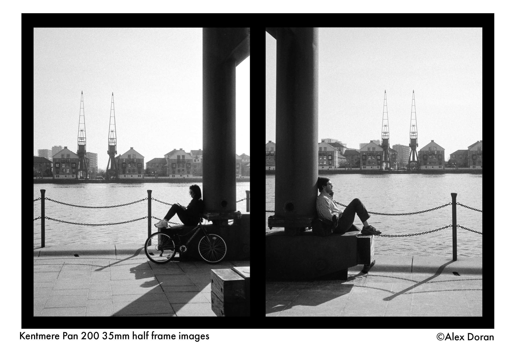 Black and white photograph showcasing Kentmere Pan 200 film in a half-frame format, capturing a serene waterfront scene.