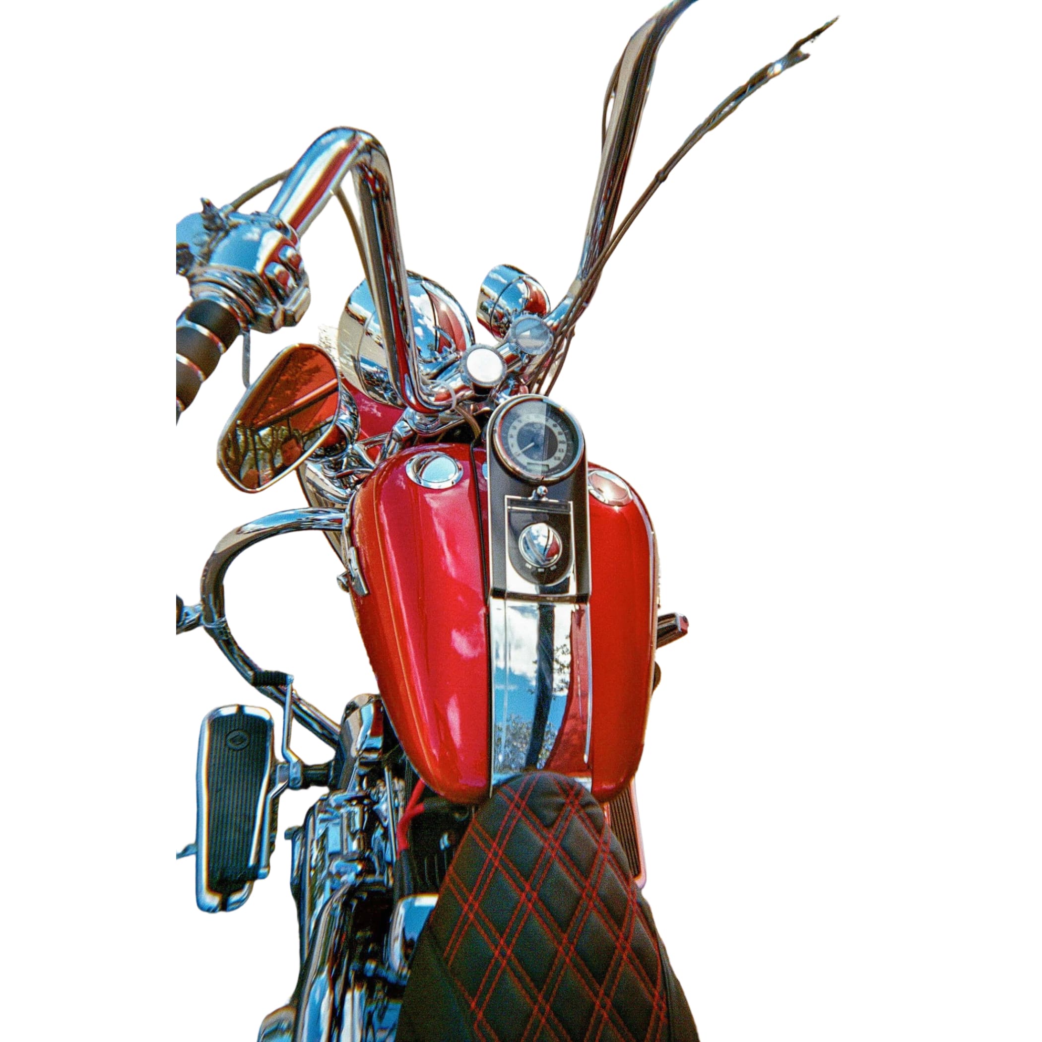 Red chrome-finished motorcycle with a black and red quilted seat.