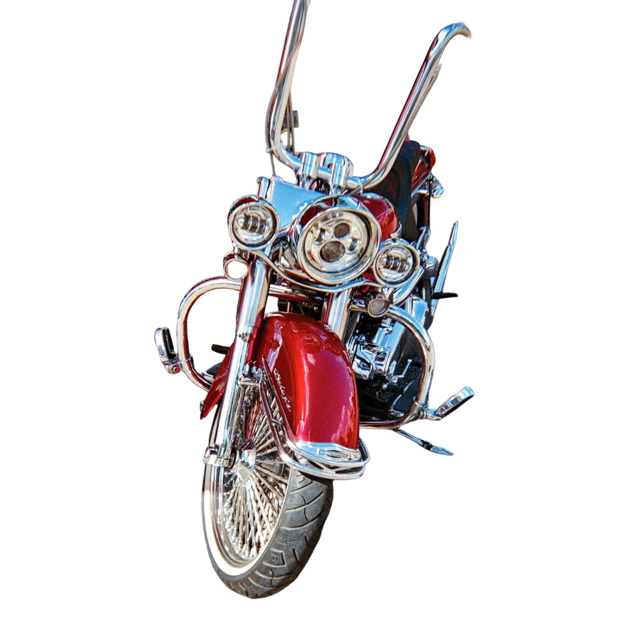 A gleaming red harley-davidson motorcycle with chrome handlebars and intricate detailing.