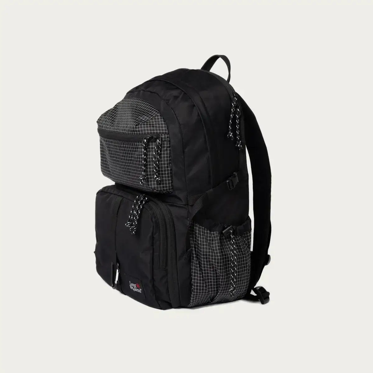 Black hiking backpack with multiple compartments and checkered mesh pockets.