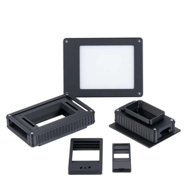 Negative Supply Simple 35 and 120 Film Scanning System components including film holders and light panel.