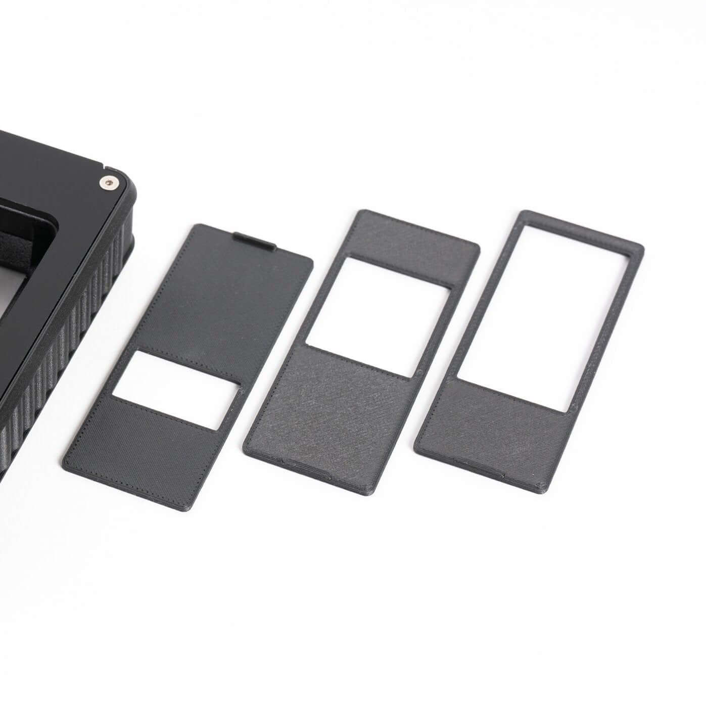 Negative Supply Simple 35 and 120 Film Scanning System accessories including film holders for precise scanning.