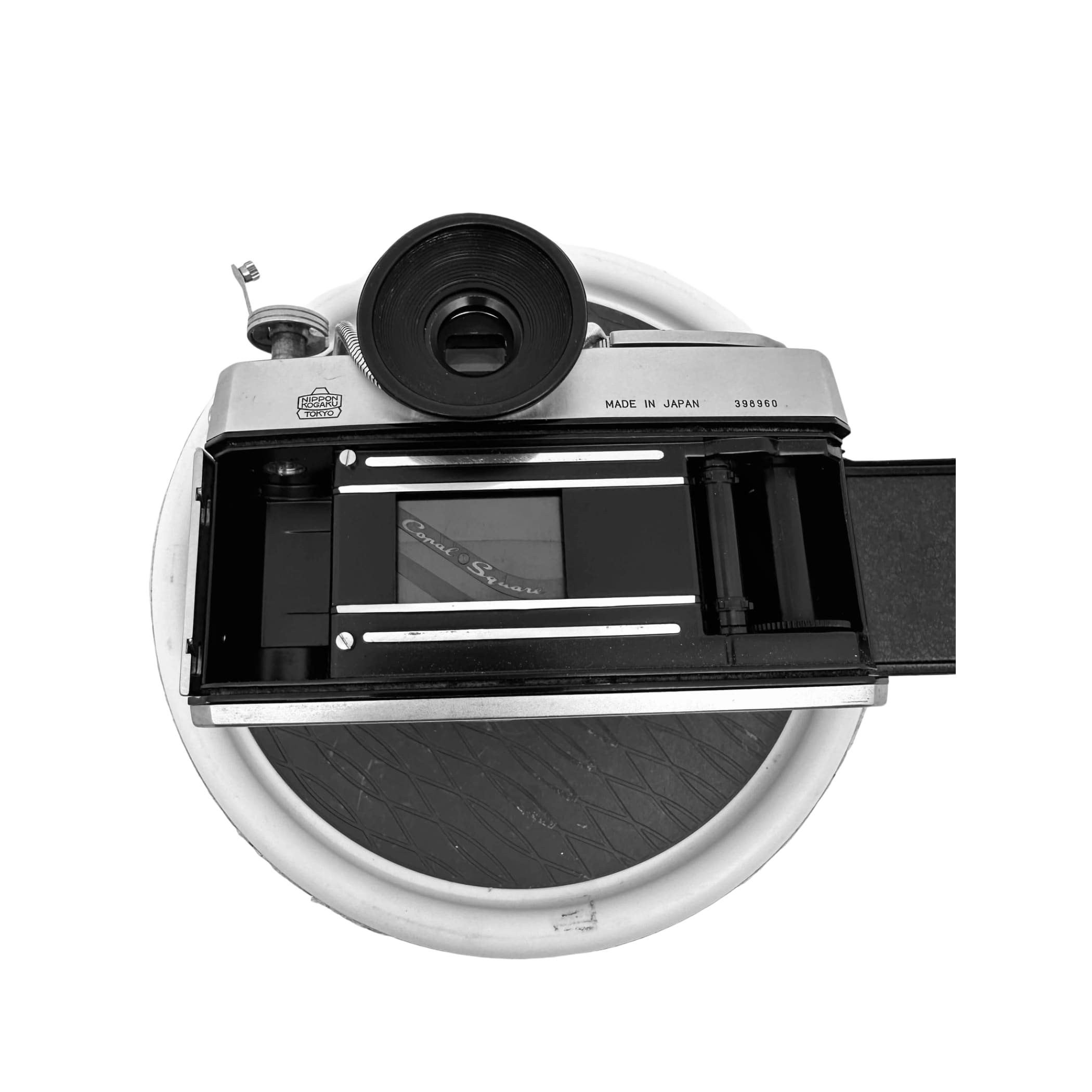 Silver-bodied canon camera with black lens and viewfinder, featuring a classic rangefinder design.