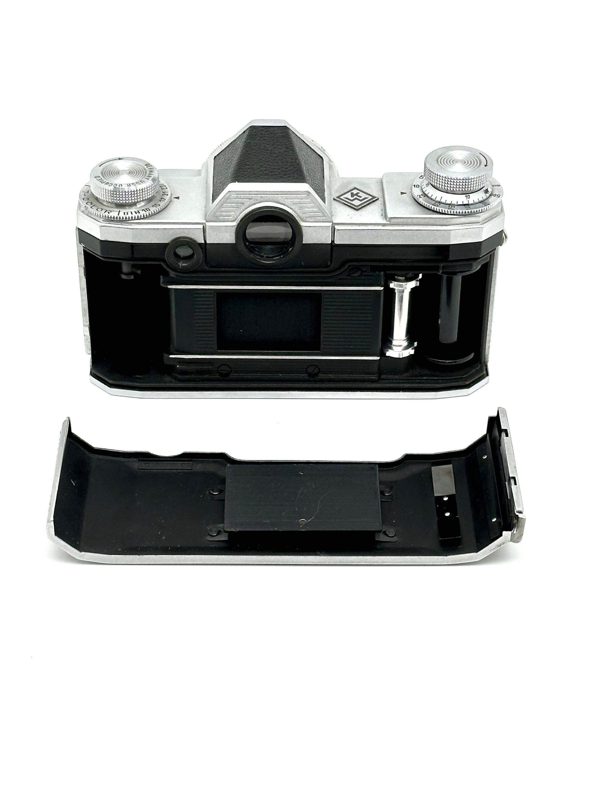 Praktina FX vintage 35mm film camera body with removable base, showcasing classic design and craftsmanship.