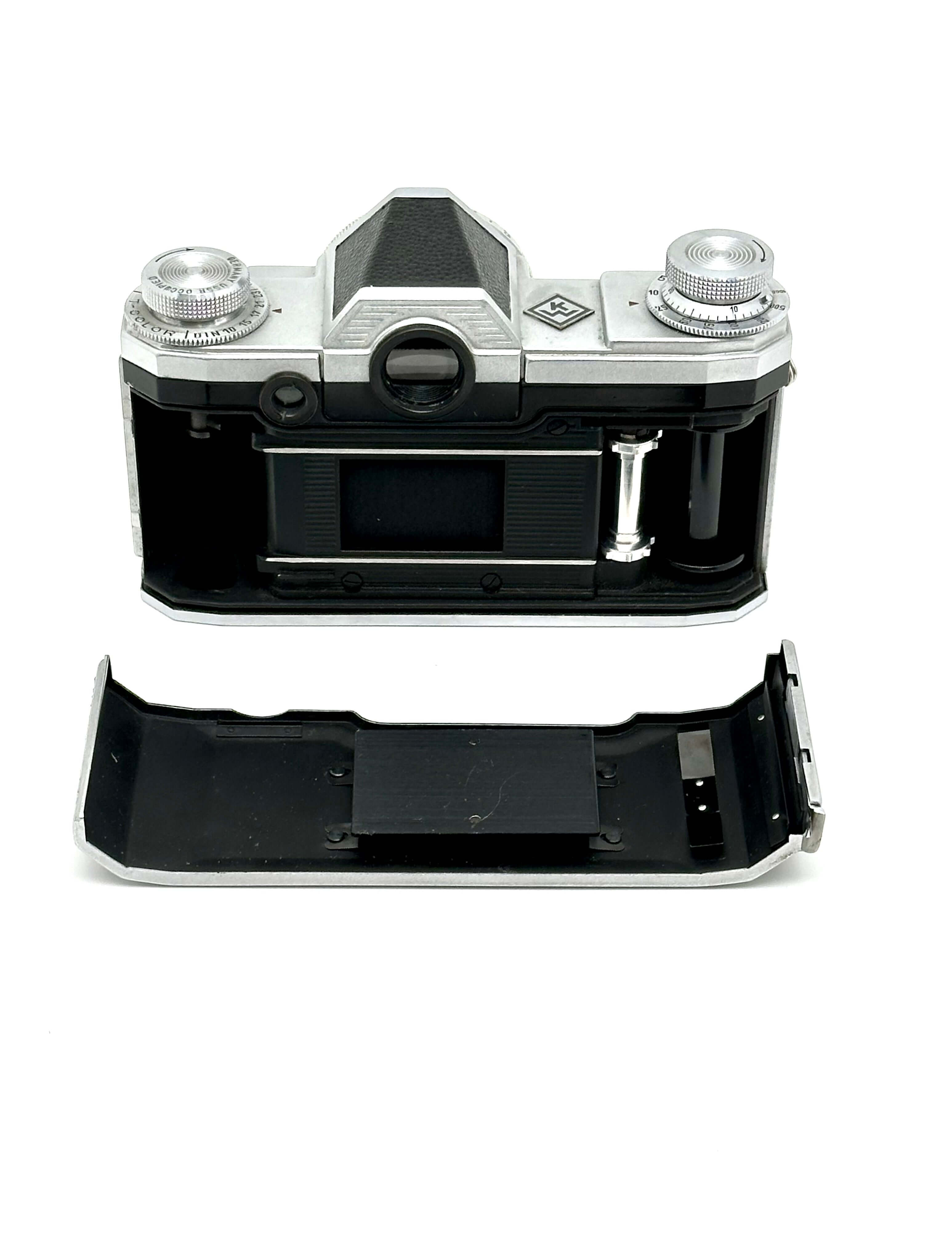 Praktina FX vintage 35mm film camera body with removable base, showcasing classic design and craftsmanship.