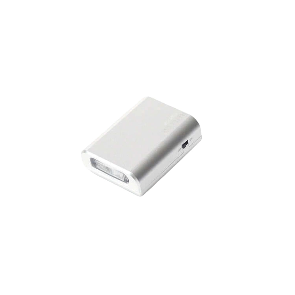 Silver rectangular portable phone charger with a usb port and an integrated led light on the front.