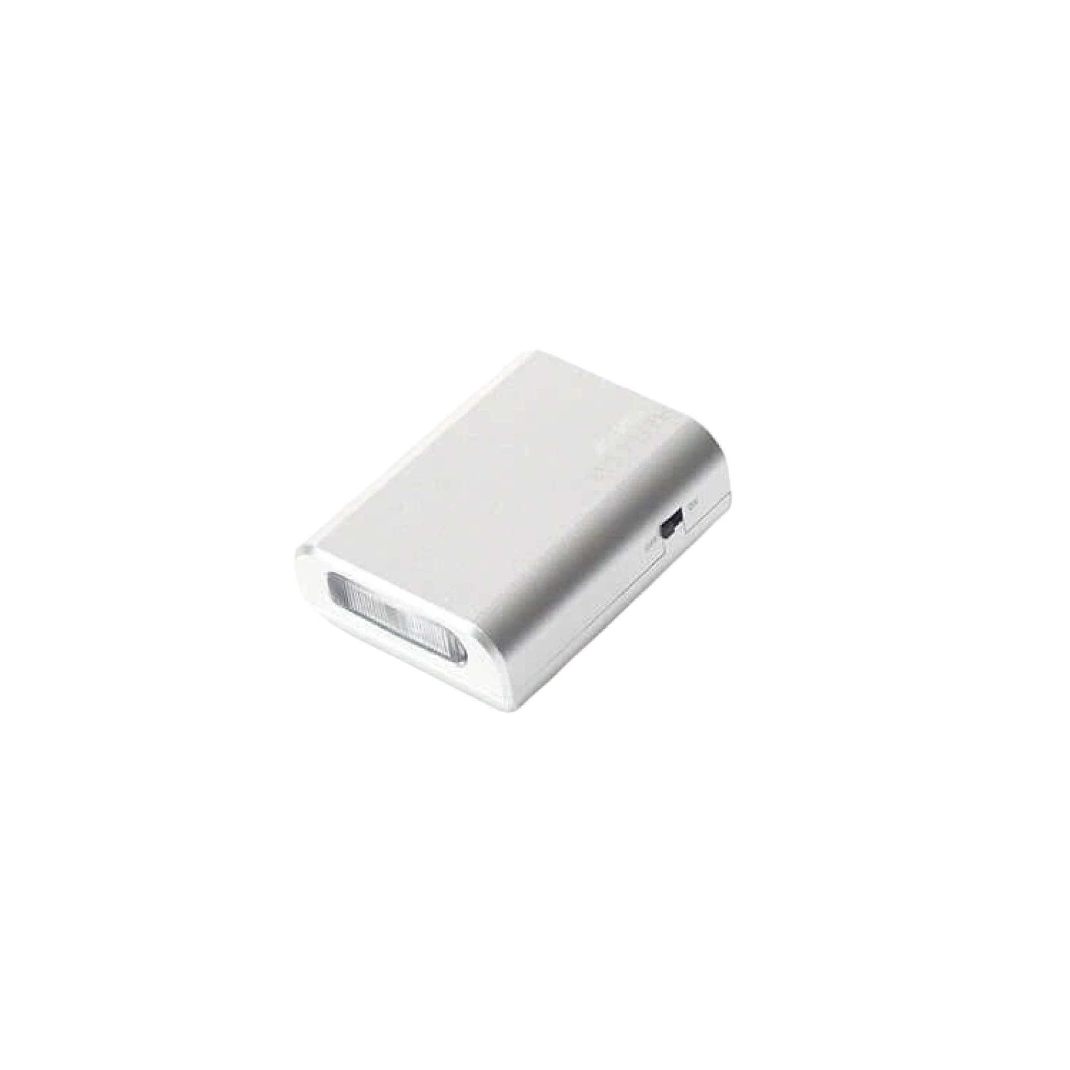 Silver rectangular portable phone charger with a usb port and an integrated led light on the front.