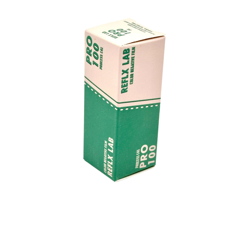 A rectangular box of refly lab pro 100 color negative film, featuring a two-tone design with beige and green sections accented by white dotted lines.