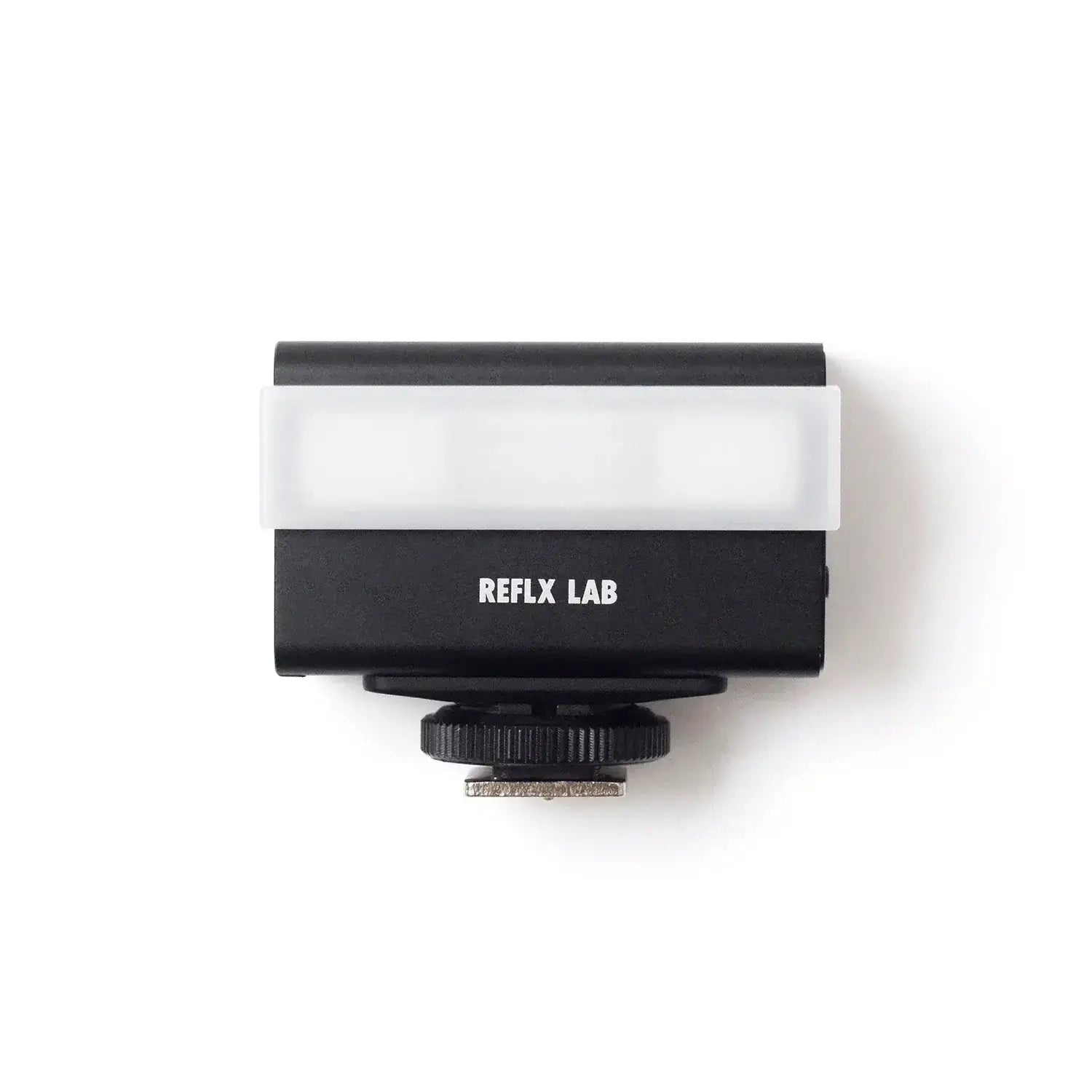 Compact black and white REFLX LAB camera accessory.