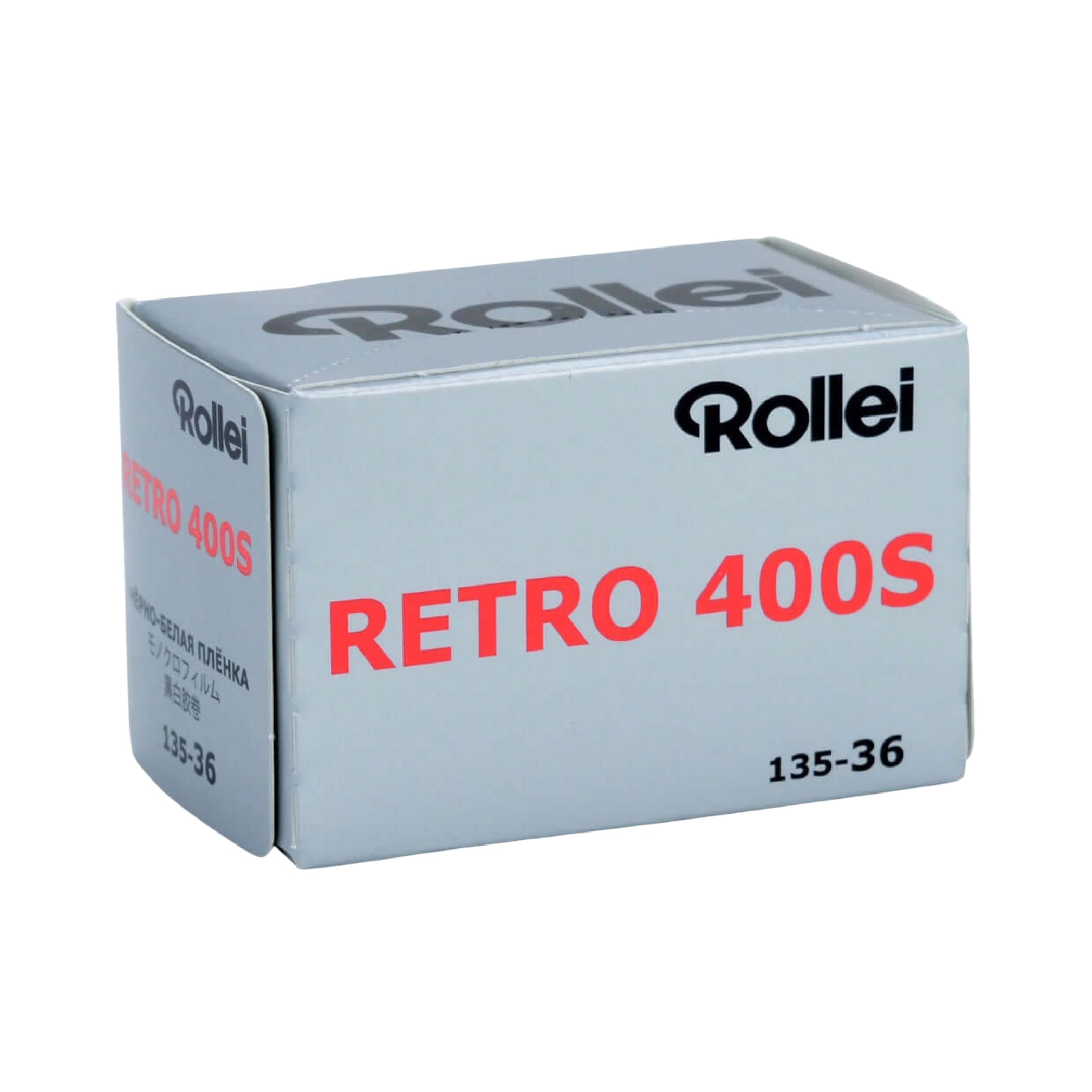 Light gray cardboard box with ’rollei’ branding and bold red text reading ’retro 400s,’ indicating it contains a film product.