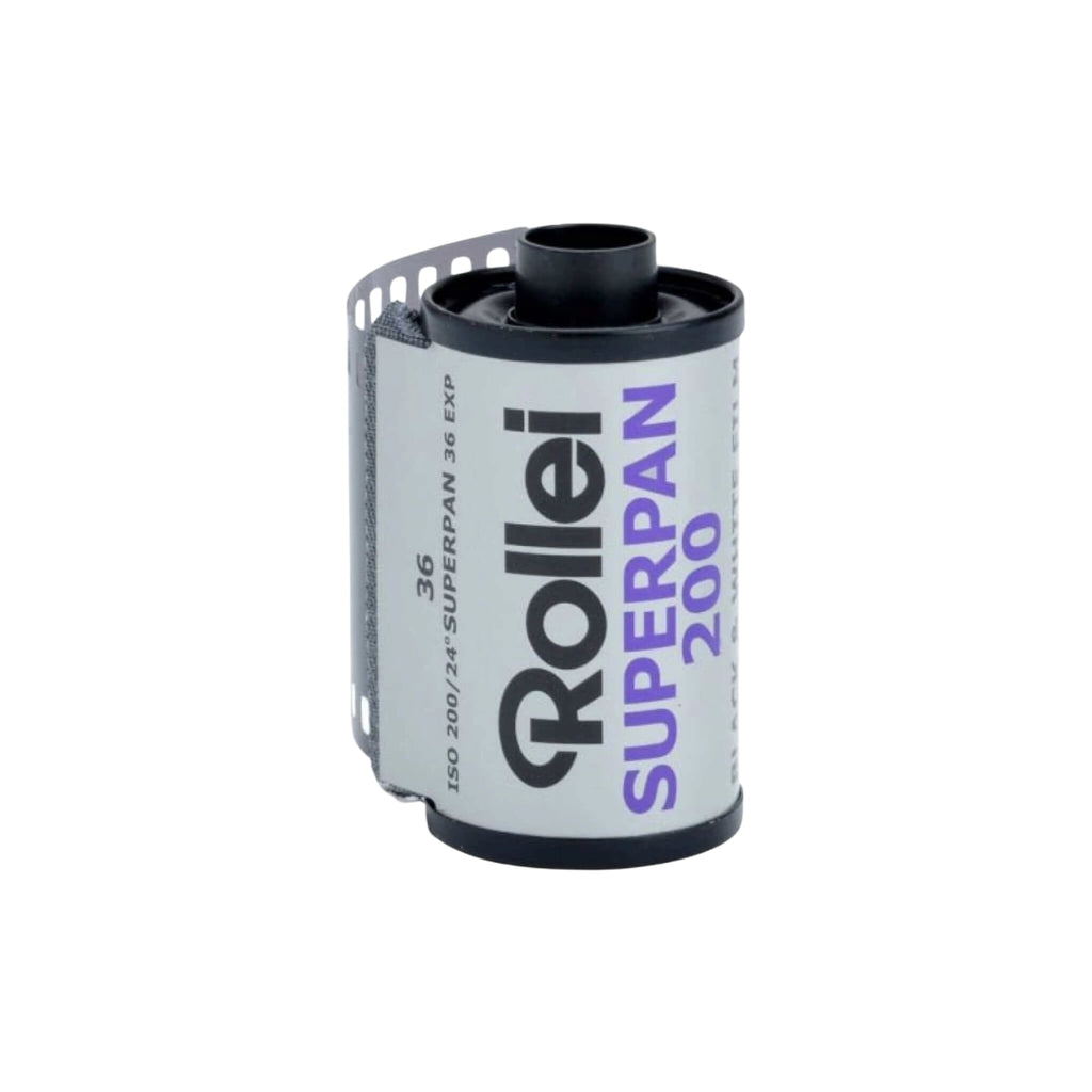 A roll of rollei superpan 200 film, featuring a white label with black and purple text on a cylindrical spool.