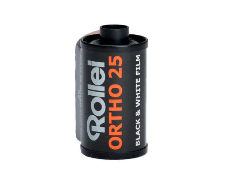 Rollei Ortho 25 black and white film roll in black canister.