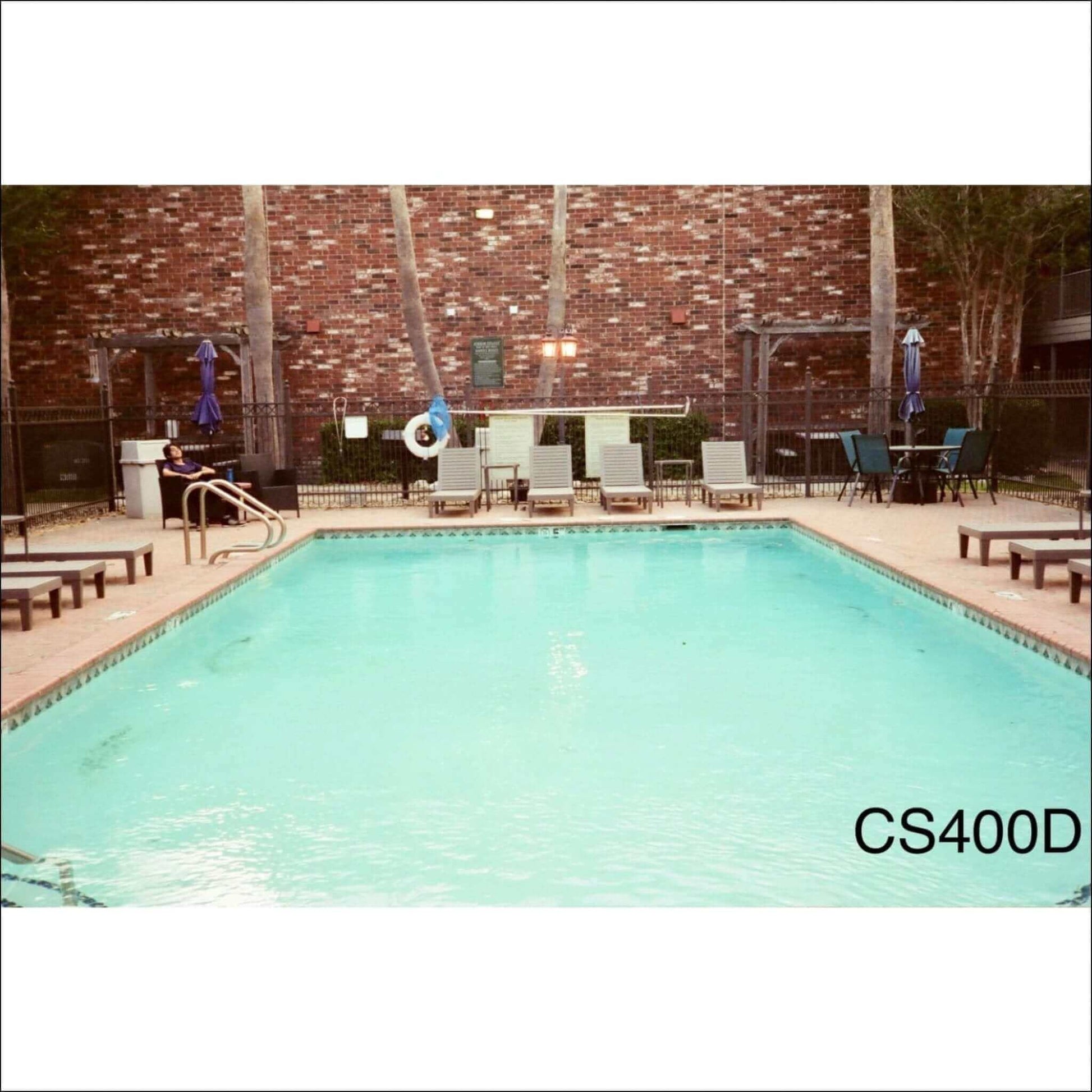CineStill 400D color film sample image of a pool scene with vibrant colors and natural lighting.