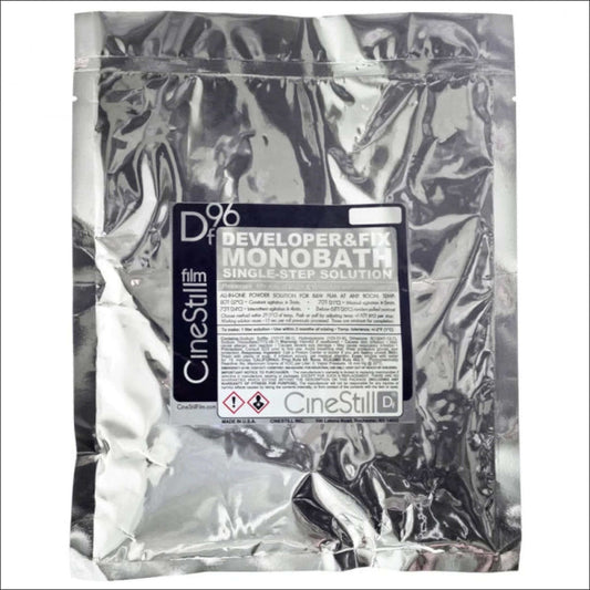 CineStill DF96 Monobath Developer & Fix single-step solution for film development in metallic packaging.