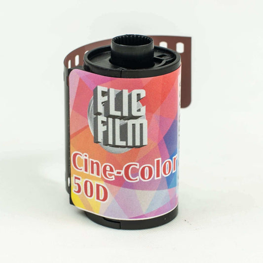Flic Film CineColor 50D ECN-2 35mm film roll showcasing vibrant design and the Remjet layer for C-41 compatibility.