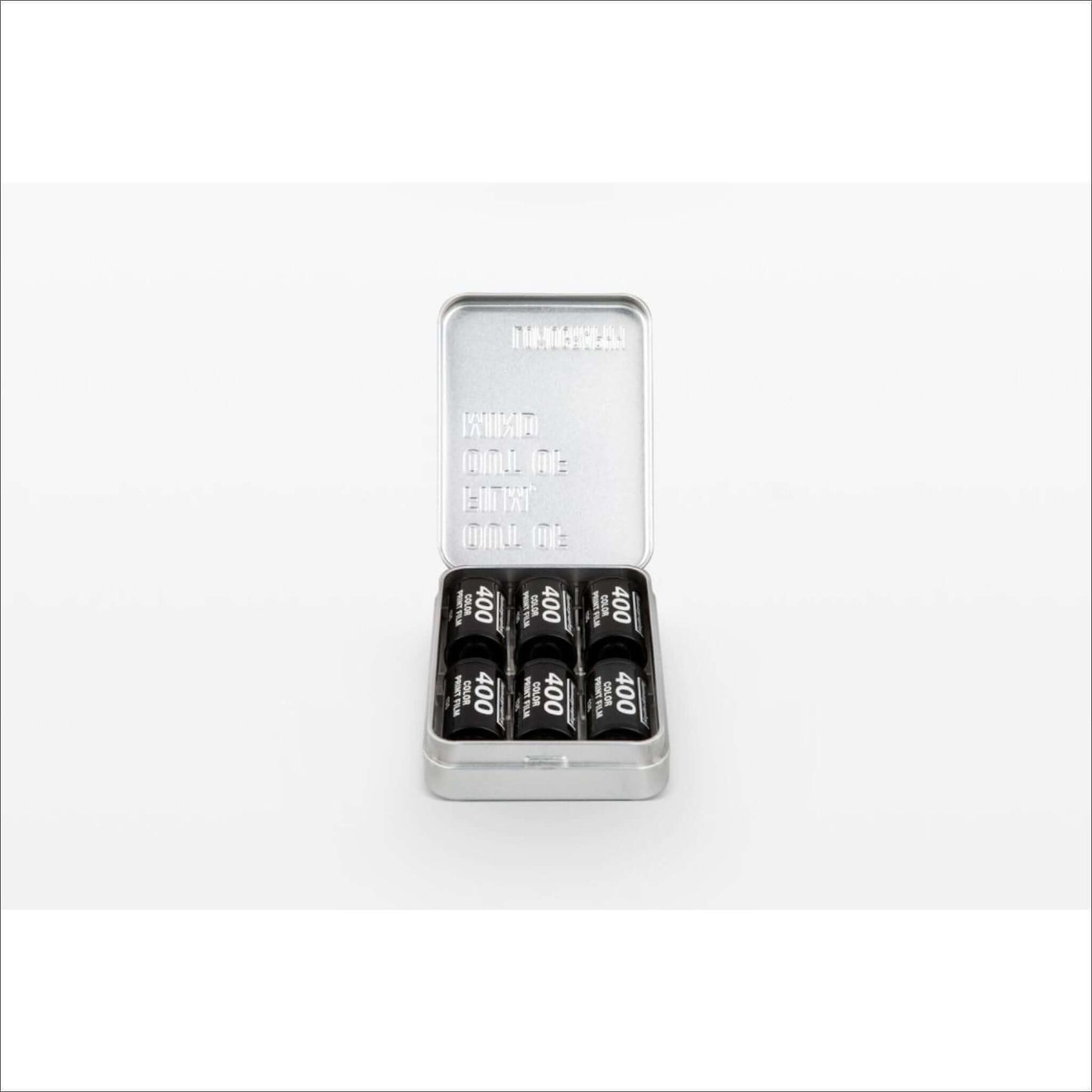 Open tin box containing six black and silver 400DX film rolls on a white background.