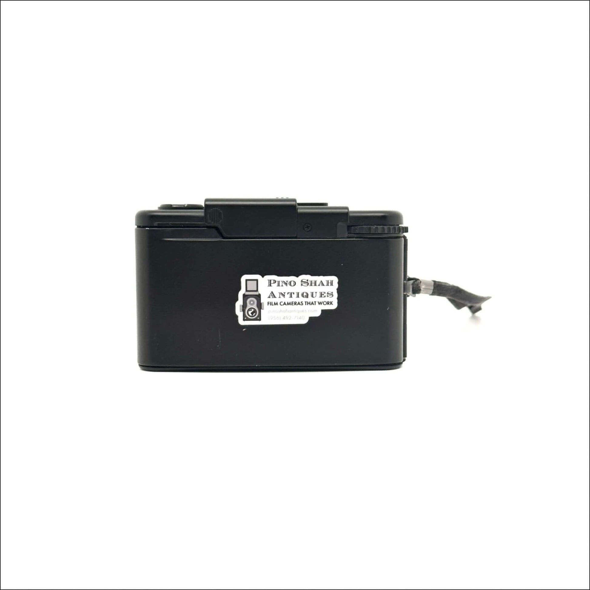 Olympus XA used vintage 35mm film camera showing minor scratches and in fine working condition.