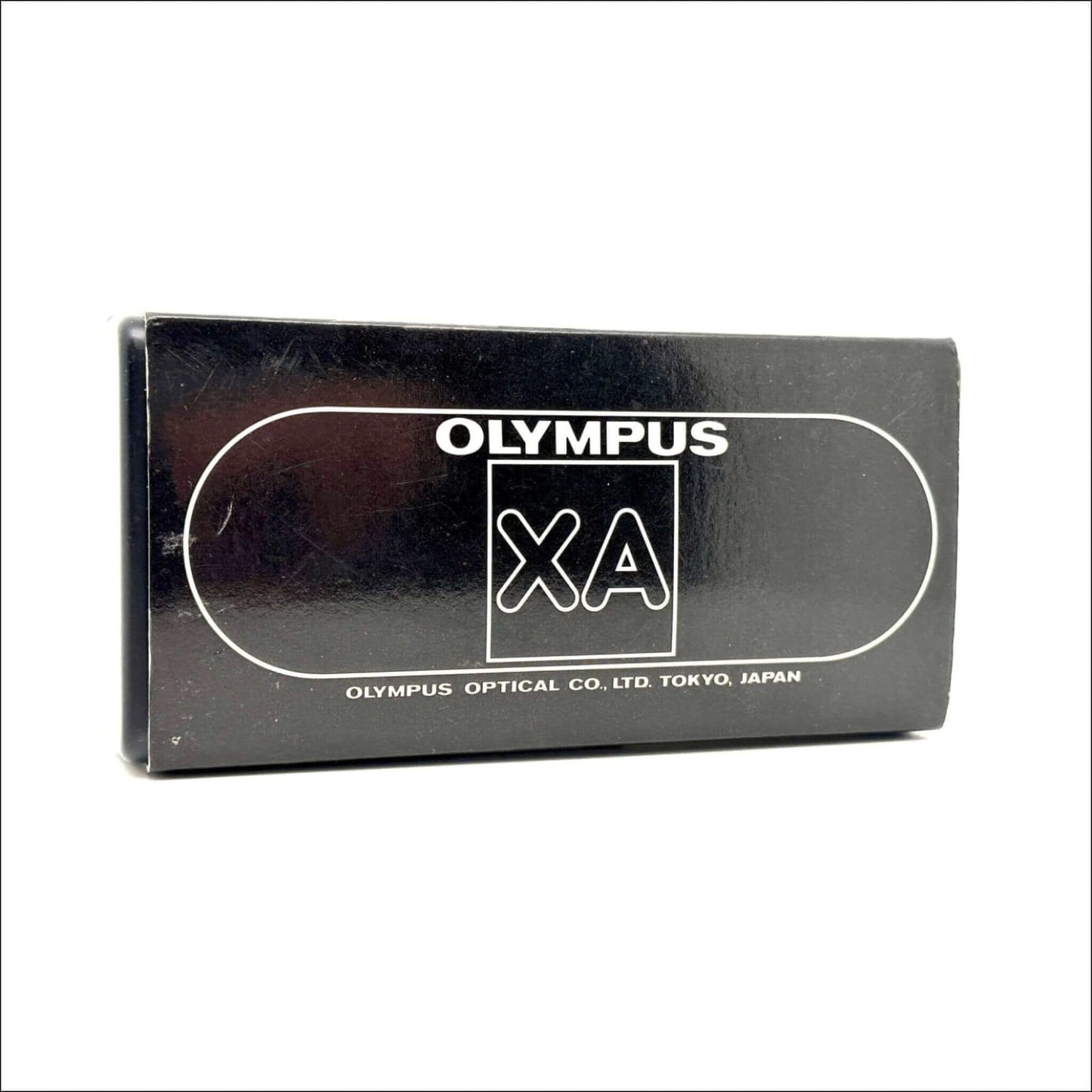 Olympus XA camera box with brand and model information displayed on the packaging.