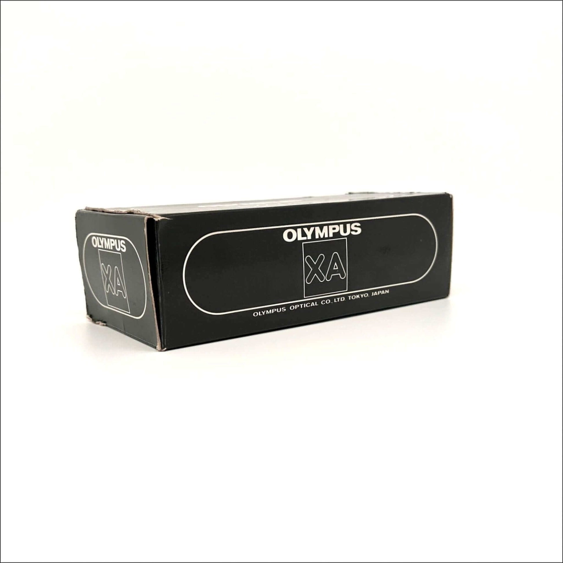 Olympus XA black camera box with white logo and text.