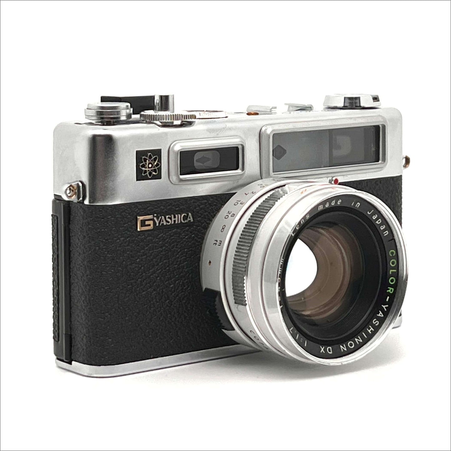 Vintage Yashica camera with black and silver design and a Color Yashinon DX lens.