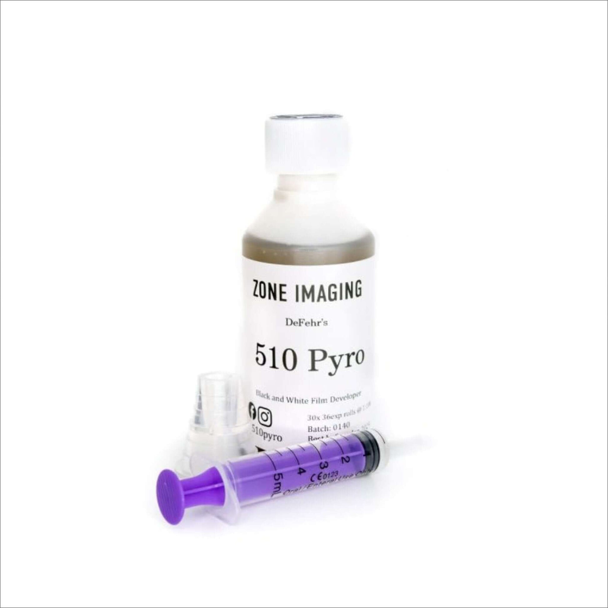 Zone Imaging 510 Pyro black and white film developer bottle with a purple syringe.